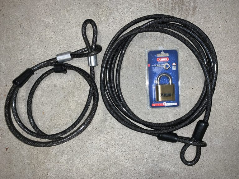 Coated waterproof steel cables and a brass lock that we use to lock up jet skis on dock or trailer