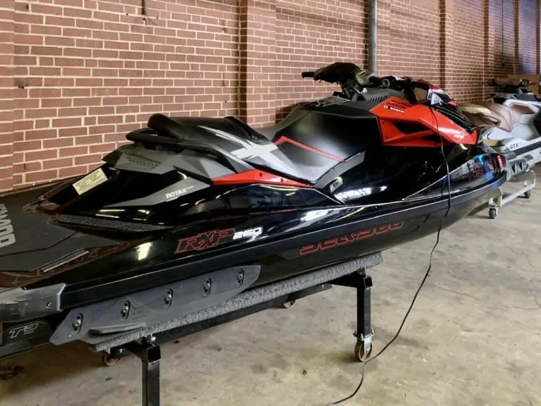 Sea Doo RXPX 260 on stand in garage